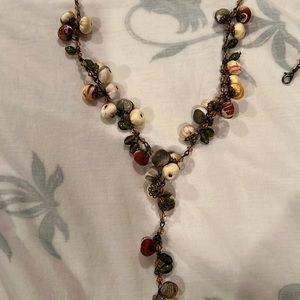 Beautiful handmade boho necklace, with fabric, beads